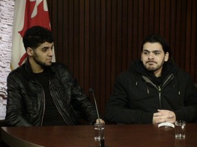 Khaled Khatib, 21, and Anthony Socci, 28, at Queen's Park Tuesday, Dec. 11, 2012. Socci needs a new kidney but Khatib, as a visitor to Canada, is not allowed to donate. Instead, Khatib will walk from Ottawa to Toronto to raise awareness and hopefully find Socci a donor. (JONATHAN JENKINS/Toronto Sun)