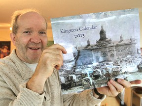 Bob Hilderley, publisher at Quarry Press, shows the 2013 calendar featuring paintings of old Kingston, which his firm is publishing. (Michael Lea The Whig-Standard)