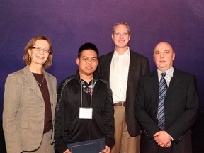 At the Keyano College Student Awards celebration, Catherine Koch, academic vice-president, takes a moment with Keyano student Rojohn Homer Torres, who received the James Carter Sr. Memorial Engineering Award, with board members Mark Little and Andy Carter. Sean McLennan/Supplied photo