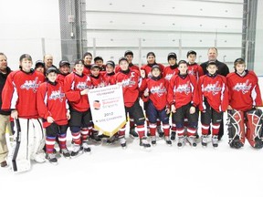 The Central Plains Minor Bantam Capitals celebrate their tournament win over the weekend in Regina. (Handout)