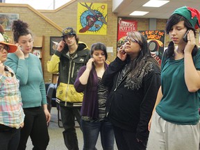 CHRISTOPHER SMITH, The Expositor

Pauline Johnson Collegiate students Becca Cainey (left), Shelby Laughlin, Mitchell Brown, Arora Maracle, Shailin Miller and Ciara Antoski make phone calls Tuesday to protest Bill 115.