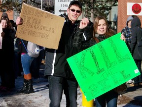 Cornwall Collegiate and Vocational School students Jonah Gillard and Sam Carriere stood in protest of Bill 115 during a student walk-out on Tuesday afternoon. 
ERIKA GLASBERG/CORNWALL STANDARD-FREEHOLDER/QMI AGENCY