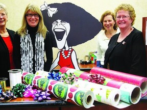 (l-r) Pat Best, Belinda Vandersluis, Tamara Kayfetz and Joanne Franke are wrapping gifts at the Cataraqui Mall every second day, from 9 a.m. to 9 p.m. as a fundraiser for Gilda’s Club.