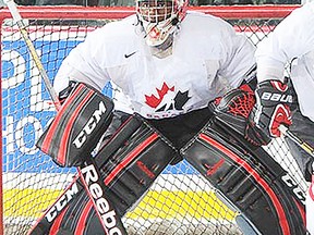 Belleville Bulls goaltender Malcolm Subban follows the action during the Red and White scrimmage Tuesday at the Team Canada world junior selection camp in Calgary. (Hockey Canada photo.)