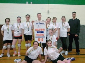 Sacred Heart's girls volleyball team are all smiles after bringing home a silver medal from a recent  tournament in New Liskeard. Team members include back row (left to right):  Tessa Stanwick, Logan Levesque, Leslie Danis, Katey Woods, Ally Demers, Destiny Sturgeon, Seanna Cholette, Adam Orth. Front Row:  Brianna Julien, McKayla Wilson,  Nina Jodko-Narkiewicz.