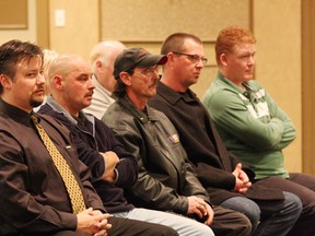 In this file photo, Patrick Veinot, left, Michael French, Ron Breault, Brian Miller and Jason Patterson look on during an Ontario Labour Relations Board hearing in Sudbury on Thursday, Dec. 8, 2011. The five men are included in the nine workers fired during the United Steelworkers Local 6500 strike against Vale in July 2009 and July 2010. Vale dismissed the workers because of alleged misconduct on picket lines during the strike. JOHN LAPPA/THE SUDBURY STAR/QMI AGENCY