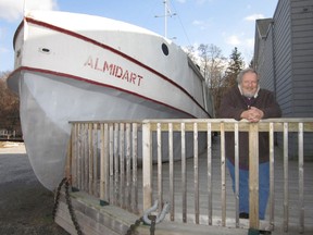 Ian Bell, curator of the Harbour Museum in Port Dover, is considering a report which contains recommendations on the eventual restoration and presentation of the fishing tug Almidart as a historical exhibit. (MONTE SONNENBERG Simcoe Reformer)