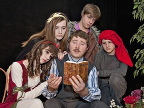 BRIAN THOMPSON, The Expositor

Walt (James Diamond) reads his story to (from left) Snow White (Sarah Almeida), Stinky (Alex Draper), The Huntsman (Jake Ford) and Angry (Cooper Bilton) during a rehearsal of Brant Theatre Workshop's presentation Snow White and Not The Usual Dwarfs.