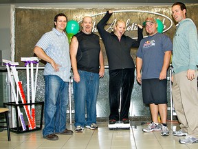 KARA WILSON, for The Expositor
 
Personal trainers John Dorosh (left) and Steve Assel (right) flank three of the local contestants in The Athletic Club's weight-loss contest: Jason Beal (second from left), Kristen Lie and Kyle Murphy.