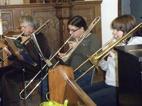 Members of the Kirkland Lake Brass Band are seen here practicing for Sunday's big show, the annual Festival of Lessons and Carols Sunday December 16th at 7pm at St. Peter’s Anglican Church in Kirkland Lake.