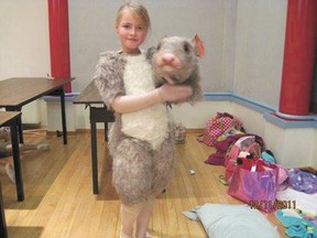 Cali McElroy, one of four Devon Dancers performing in the Alberta Ballet’s production of The Nutcracker, in costume as a mouse before one of her appearances in 2011.