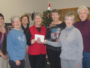 Members of Epsilon Alpha sorority presented a $400 donation to Kincardine and District Ministerial Food Bank on Dec. 6, 2012. Instead of purchasing Christmas gifts for each other, the sorority members took up a collection for the food bank. Epsilon Alpha members (L-R) Frances Nixon, Marg Sussens, Joanne Ballantyne and Marg Lamont   presented the cheque to Nancy Dawson, Pat Stewart and Marg Scurfield of the food bank. (SARAH SUTTER/KINCARDINE NEWS)