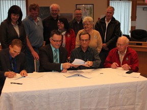 Board members of the CCBCC, town administration and town council gathered together to commemorate the signing of the joint-development agreement between the Town of Beaumont and the CCBCC.