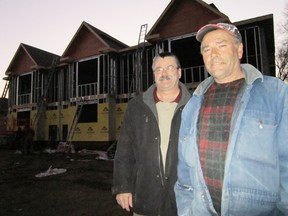 A significant uptick in residential activity in Norfolk this year includes this $1-million six-plex rental building now under construction on Norfolk Street South in Simcoe near the intersection of Cherry Street. The developer is Joe Pereira, right, owner of the Rack & Q in downtown Simcoe, while his agent and spokesman is Simcoe realtor Bill Culver. (MONTE SONNENBERG Simcoe Reformer)
