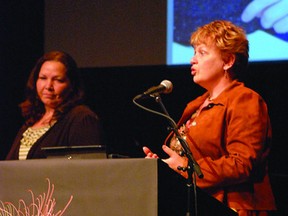 Strathcona County Coun. Roxanne Carr (right) presents Linda Pedley with an Arts,and Culture award in 2011. File Photo