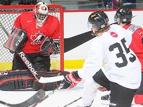 Belleville Bulls goalie Malcolm Subban makes a save for Team Canada in a 2-0 exhibition win over the University of Calgary Thursday in Calgary. (Hockey Canada photo.)