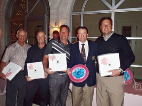 Submitted Photo

Nick Mansill (second from right), president of the Bermuda Golf Association, poses with the team of Garry Annis (left), Dan Walker, Neil Higgins and  Dennis Hendershott, which won the low net championship at the Goodwill Pro-Am Golf Tournament in Bermuda.