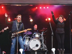 Santa and the gang performed from a boxcar stage in both Cochrane and Morley. Dec. 13. Joining Santa, from left were Brent Pearen, Chris Thorsteinson, Steve Broadhurst, Miss Emily and Dave Wasyliw.