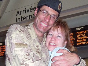 Photo submitted to The Star
Sudbury Doctor Ray Wiss sees his wife for the first time after arriving at Pearson Airport in Toronto in February following a tour in Afghanistan.