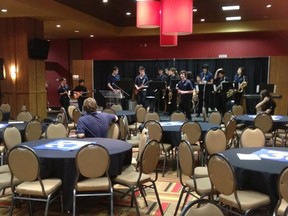 Participants begin to gather at Scotiabank Place for the Ottawa Catholic School Board Peace Conference as the Holy Trinity Rhythm and Blues Band plays on stage. (Paul Maguire photo via Twitter)