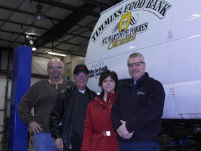 On hand for the presentation this week was, left to right, Royal Tire owner Ken Gallant, Timmins Food Bank president Rick Young, Xstrata Copper Kidd Communications & Community Relations Coordinator Carole Belanger and Royal Tire co-owner Mario Godin. Timmins Times LOCAL NEWS photo by Len Gillis.