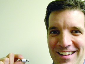 Dr. Lawrence Hookey, gastroenterologist at Hotel Dieu Hospital, shows off the latest addition in colon screening technology. The vitamin-sized capsule, which is swallowed by patients, holds a tiny camera that provides real-time imaging of the bowel. It is the fourth and newest tool developed to screen for colorectal cancer, but is not yet covered by OHIP.