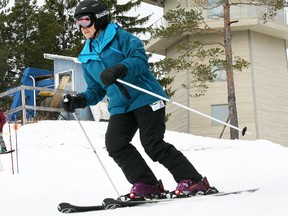 Mariette Valade enjoys her first ski of the season during the opening day of the Laurentian Ski Hill, Friday. (MARIA CALABRESE The Nugget)