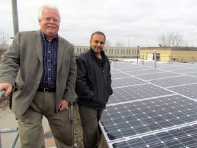 John Millson, left, President of Great Lakes Energy Inc. of Windsor Ont.  is installing a large solar rooftop system on a commercial building owned by Sarnia Ontario's Henry Mehta, right. Once the first project is complete, Great Lakes plans to install an identical system on a second building owned by Mehta.(CATHY DOBSON, The Observer)