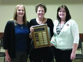 Susan Schmeelke, middle, is this year’s recipient of the Ron Pelham Award. Submitted photo