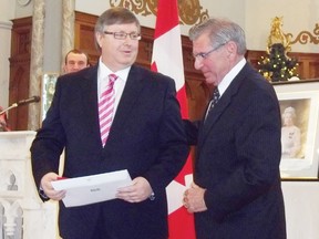 Prominent lawyer Sean Adams receives his Diamond Jubilee medal from local MP Guy Lauzon.
Staff photo/KATHRYN BURNHAM