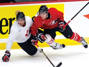 Ryan Sproul is seen here tangling with Mark Scheifele during Team Canada World Jr. tryouts.