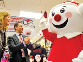 Liberal leadership candidate Sandra Pupatello and Sault Ste. Marie MPP David Orazietti ham it up with Mr. Bon Soo.