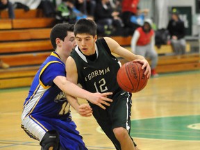 The O'Gorman Senior Knights opened the 43rd Annual Zenon Ziemba Basketball Tournament with a 2-0 record heading into Saturday. Knights guard-forward Matt D'Alessandri goes one on one against a École secondaire catholique Saint Marie Apollo defender in the third quarter. The Knights won 53-25.