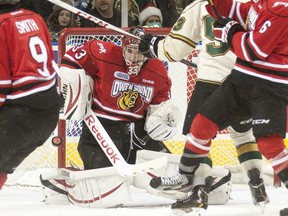 Owen Sound Attack goalie Brandon Hope keeps his eyes on an incoming shot by the London Knights during an OHL hockey game at Budweiser Gardens in London on Friday.