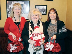 SEAN CHASE    Volunteers and staff at Kelsey’s Restaurant in Petawawa are preparing for the seventh annual Christmas Angels Luncheon, which will be held on Tuesday, Dec. 25 from 11 a.m. to 2 p.m. In the photo (left to right) are Kelsey’s general manager Kim Clouthier, organizer Gloria Deane-Freeman, and Councillor Theresa Sabourin.