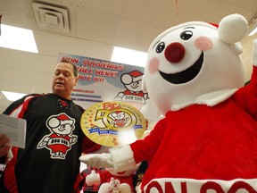 Brett Lund, president of Ontario Winter Carnival Bon Soo, and Mr. Bon Soo appear at a funding announcement at Station Mall on Friday, Dec. 14, 2012. (PHOTO: Michael Purvis, The Sault Star)
