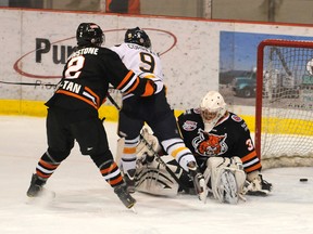 TERRY FARRELL/DAILY HERALD-TRIBUNE
Gus Correale slips the puck under Bobcat goalie Chase Martin for a 2-0 Storm lead. It was Correale’s second goal of the game, just five minutes in. The Grande Prairie Storm defeated the Lloydminster Bobcats 4-1 in Alberta Junior Hockey League action at the Canada Games Arena in Grande Prairie, Alberta, Friday, Dec. 14, 2012.