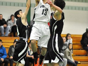 The O'Gorman High School Senior Knights defeated the St. Ignatius Falcons from Thunder Bay 60-42 on Saturday in the senior final of the 43rd Annual Zenon Ziemba Basketball Tournament. Tournament most valuable player Skylar Cornell flies through the air in the third quarter versus the Falcons.