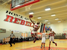 Woodrow Wilson Wildcats (from Dallas, Texas, USA) forward Chance Houston goes for a lay-up during the first quarter of their third place senior boys game against the White Rock Christian Warriors at the 31st annual Go Auto REB Invitational Basketball Tournament at Jasper Place high School in Edmonton, AB, on Saturday, Dec. 15, 2012. TREVOR ROBB/QMI AGENCY