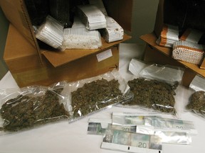 The RCMP announced the results of a one-year project aimed at dismantling the upper-tiers of a contraband tobacco and smuggling ring in the Cornwall area in September. Project Ostone resulted in 188 charges against 12 people. Cops seized marijuana, cash and 401 cases of cigarettes. 
DOUG HEMPSTEAD/QMI Agency
