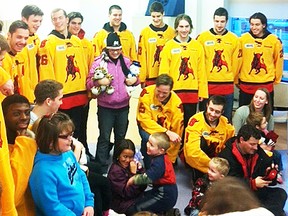 Belleville Bulls players pay a recent Christmas visit to children at BGH. (Photo submitted)