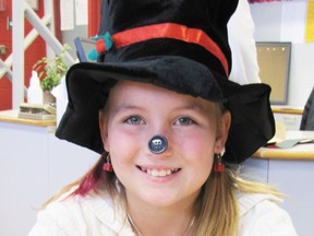 Grade 5 student, Jorja Werenka, 10, portrays Frosty the Snowman.