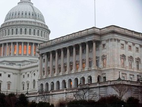 The U.S. Capitol Building stands in Washington December 17, 2012. The first real movement in the "fiscal cliff" talks began on Sunday, with Republican House Speaker John Boehner edging slightly closer to President Barack Obama's key demands as they try to avert the steep tax hikes and spending cuts set to take effect unless Congress intervenes by December 31. (REUTERS/Joshua Roberts)