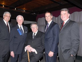 Gerry Lougheed Sr., centre, was honoured with the Paul Harris Award at the Caruso Club in 2007. He is flanked by, from left, Geoffrey Lougheed, Rotary International President-Elect Wilfrid Wilkinson, Ontario Premier Dalton McGuinty and Gerry Lougheed Jr. GINO DONATO/SUDBURY STAR FILE PHOTO