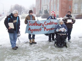 SCAP protesters speak to the media in this file photo.