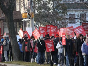Hundreds of public elementary teachers gathered outside the Sarnia board office in Sarnia, Ont. Tuesday, Dec. 18, 2012. Nearly half of all Ontario elementary teachers walked the picket line on "Super Tuesday," protesting the controversial Bill 115.  (BARBARA SIMPSON, The Observer)