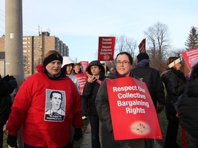Hundreds of public elementary teachers gathered outside the Sarnia board office in Sarnia, Ont. Tuesday, Dec. 18, 2012. Nearly half of all Ontario elementary teachers walked the picket line on "Super Tuesday," protesting the controversial Bill 115.  (BARBARA SIMPSON, The Observer)