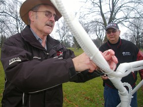 Don Burgess, left, and Al Bogart, perform maintenance Tuesday, Dec. 18, 2012 on theUnion United Church display at the Holiday Fantasy of Lights. Both are members of the congregation. The Holiday Fantasy of Lights continues nightly through Dec. 31 at Pinafore Park.
ERIC BUNNELL/Times-Journal/QMI AGENCY