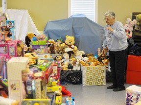 The Salvation Army volunteer Joan Hunsley helps sort toys for the Christmas hamper program in Tillsonburg. CHRIS ABBOTT/TILLSONBURG NEWS