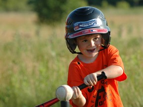 Carter Smith steps up to the plate as Formet took on The Yellow Sign People in St. Thomas Minor Baseball Association T-ball action in June. (R. MARK BUTTERWICK  Times-Journal)